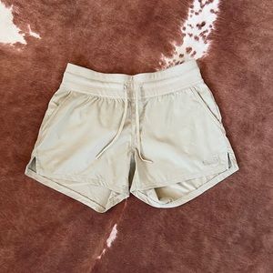North Face Aphrodite Motion Shorts in Twill Beige